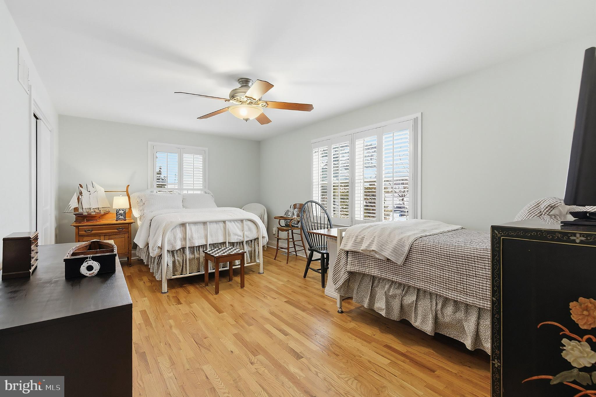 33 Sands Point Road Waretown, NJ 08758 - Photo 9 of 79 a bedroom with a bed and a large window