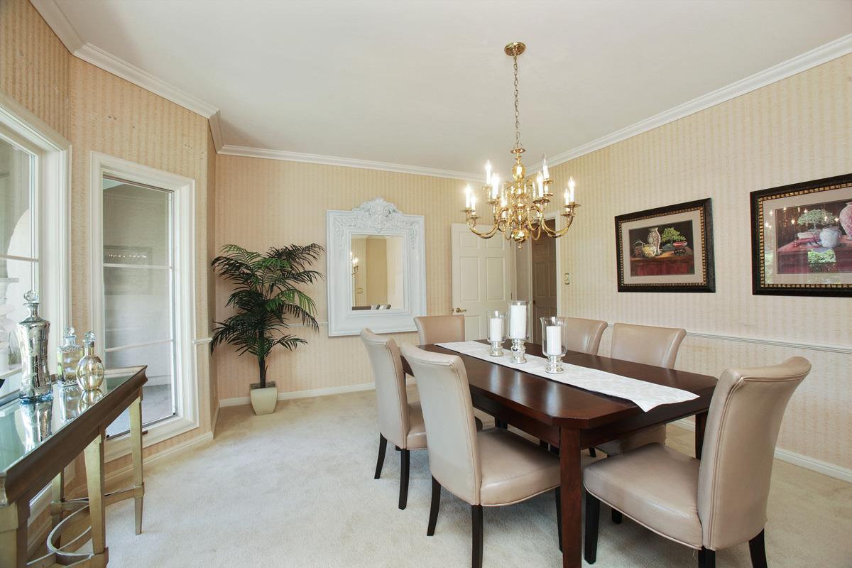 Stonepine Road Hillsborough, CA 94010 - Photo 13 of 25 a view of a dining room with furniture and a chandelier