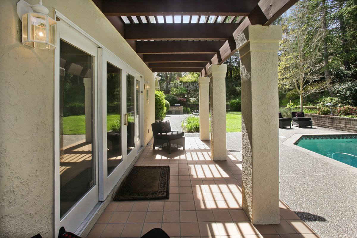 Stonepine Road Hillsborough, CA 94010 - Photo 21 of 25 a view of a porch with wooden floor