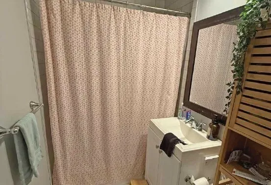 a bathroom with a sink and mirror