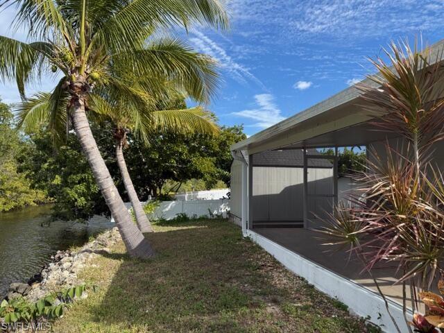 585 14th Street North Naples, FL 34102 - Photo 20 of 24 a view of a backyard