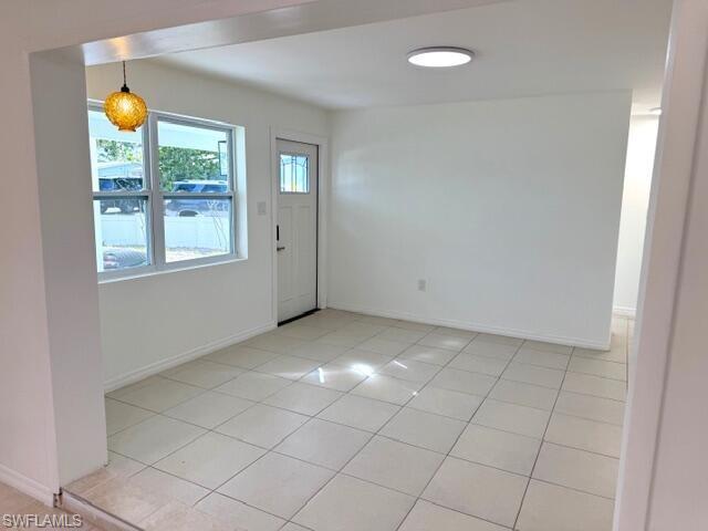585 14th Street North Naples, FL 34102 - Photo 5 of 24 an empty room with windows