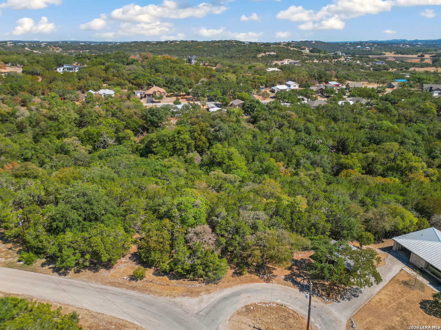 1268 Overbrook Lane Spring Branch, TX 78070 - Photo 7 of 20 an aerial view of residential houses with outdoor space and trees