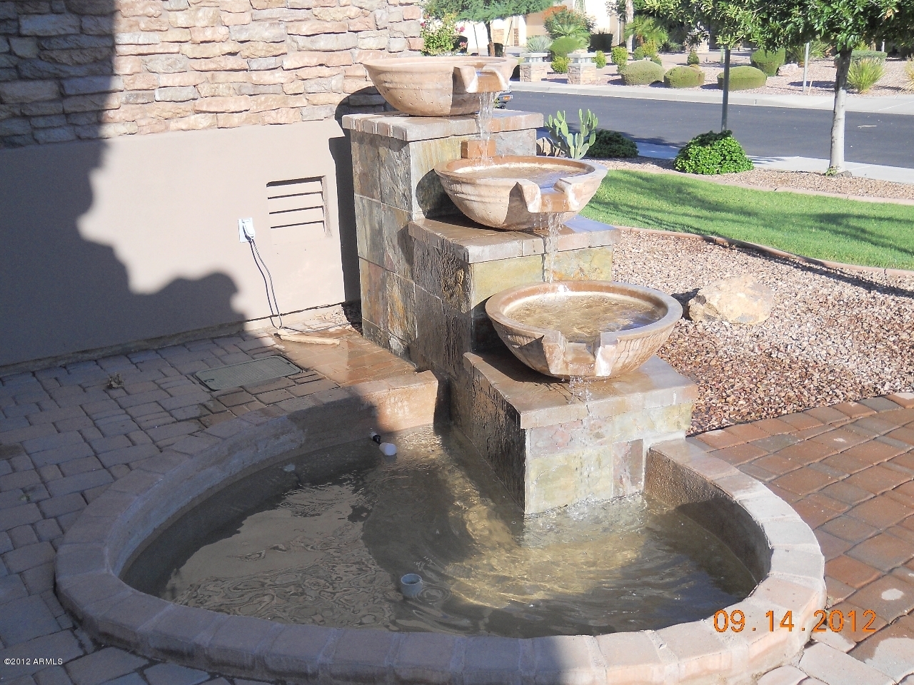 2741 East Blue Ridge Way Chandler, AZ 85249 - Photo 6 of 9 Water fountain in front of house
