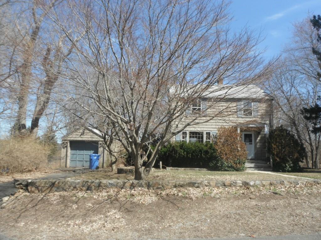 86 Isinglass Road Shelton, CT 06484 - Photo 1 of 1 a front view of a house with a yard