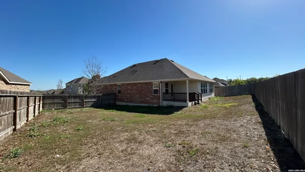 a house view with a garden space