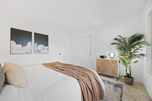 a view of a swimming pool with a yard