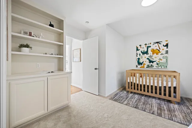 a view of a city with mountains in the background