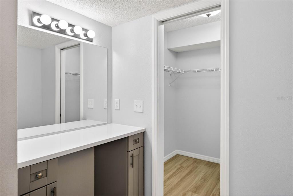 5197 Silent Loop, Unit 124 New Port Richey, FL 34652 - Photo 33 of 55 a bathroom with a sink and a mirror