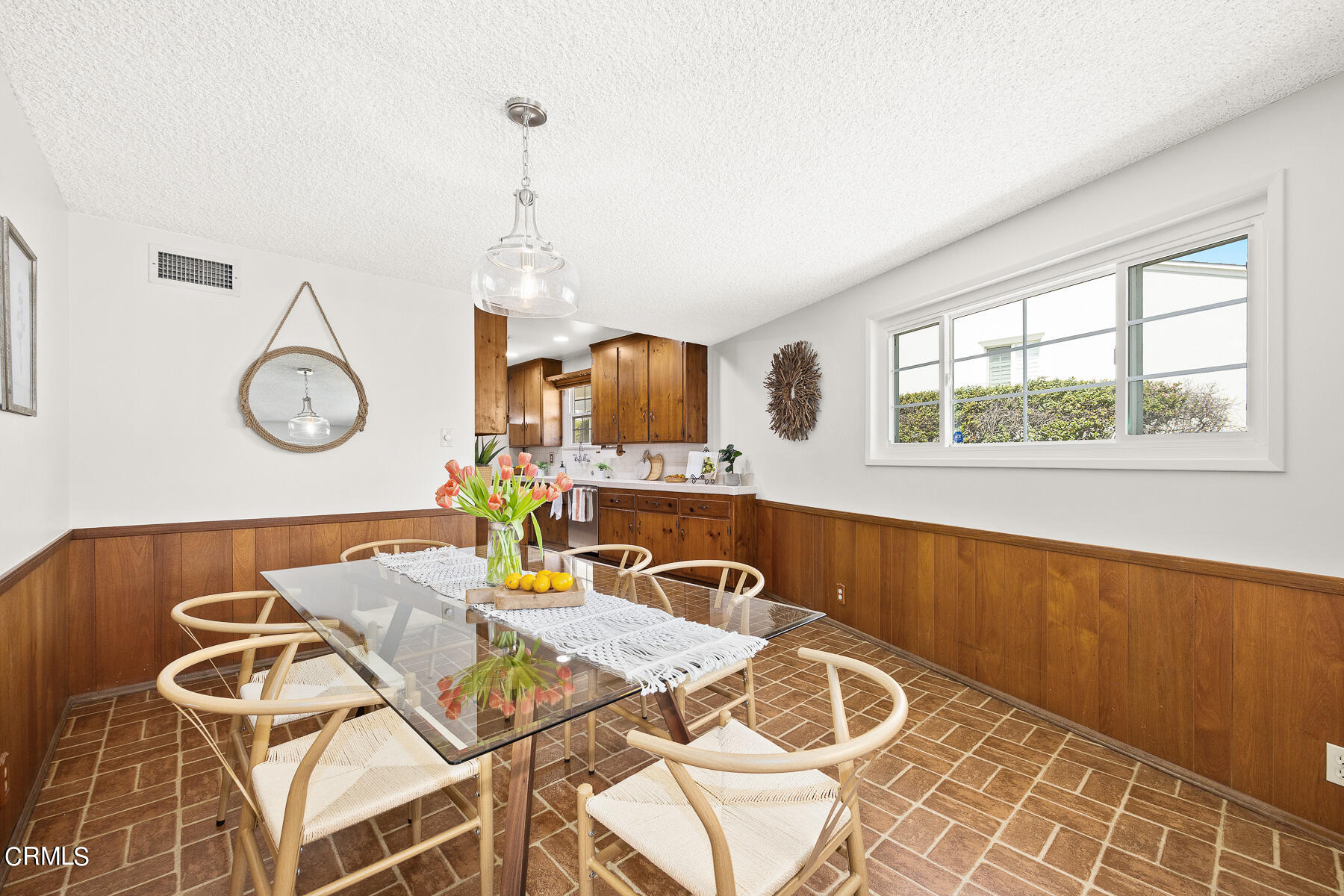 632 Brown Drive Burbank, CA 91504 - Photo 14 of 49 a view of a dining room with furniture window and wooden floor