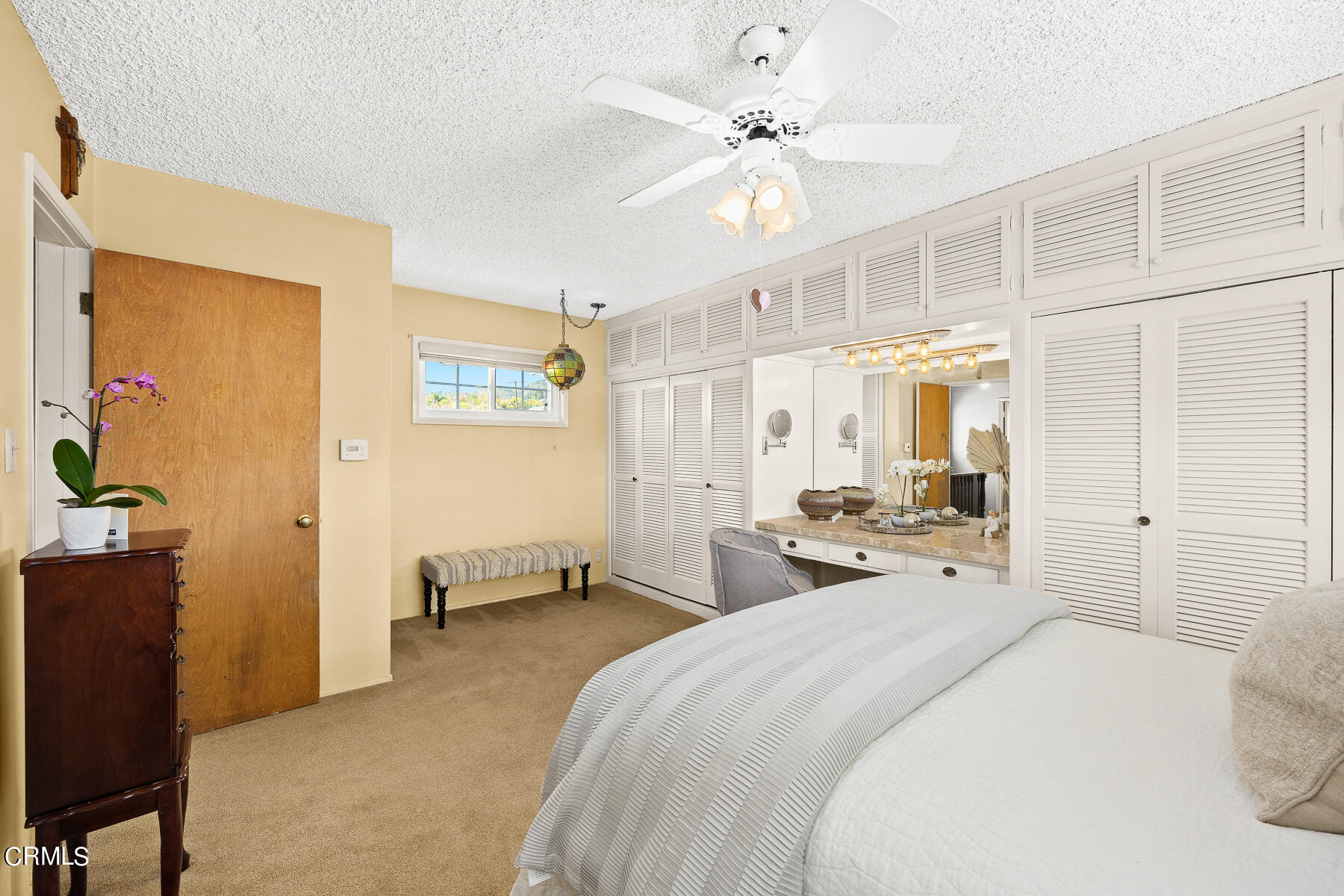 632 Brown Drive Burbank, CA 91504 - Photo 24 of 49 a bedroom with a bed and ceiling fan