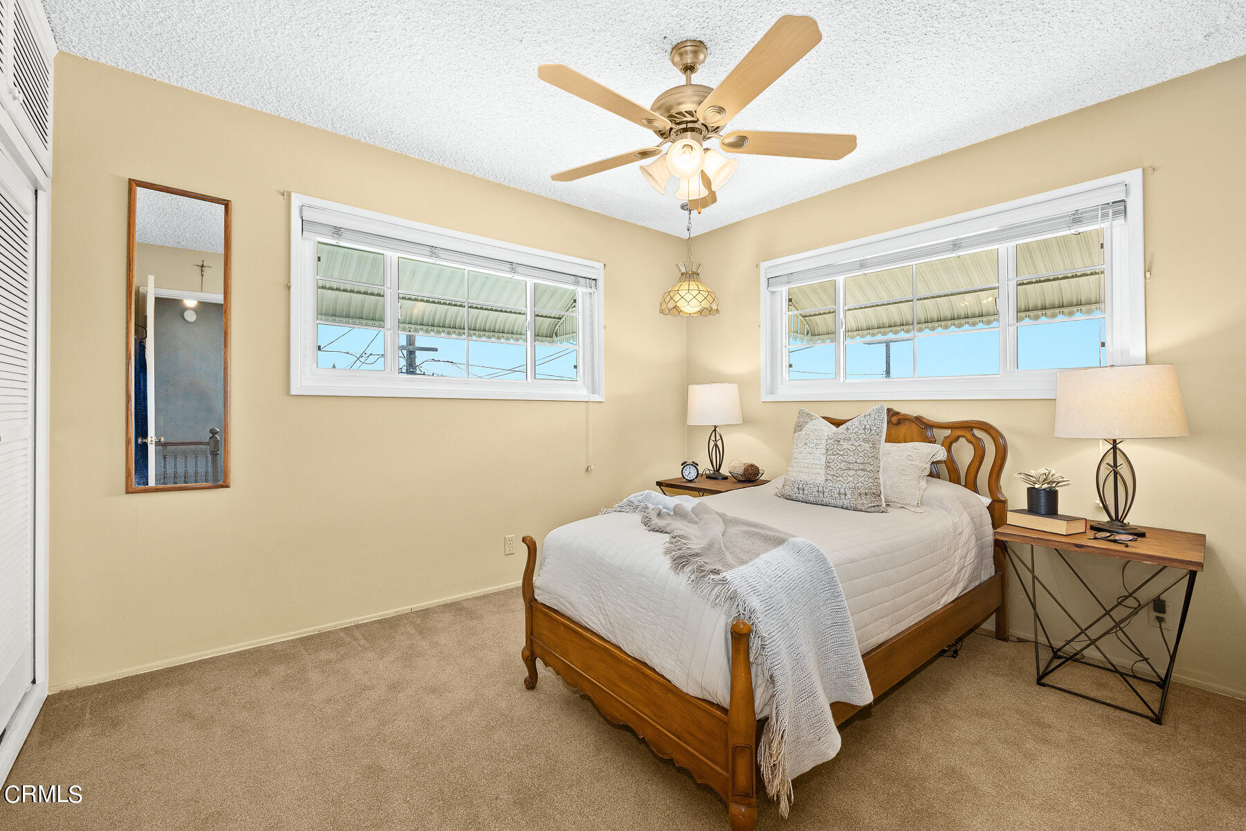 632 Brown Drive Burbank, CA 91504 - Photo 26 of 49 a bedroom with a bed chandelier and a window