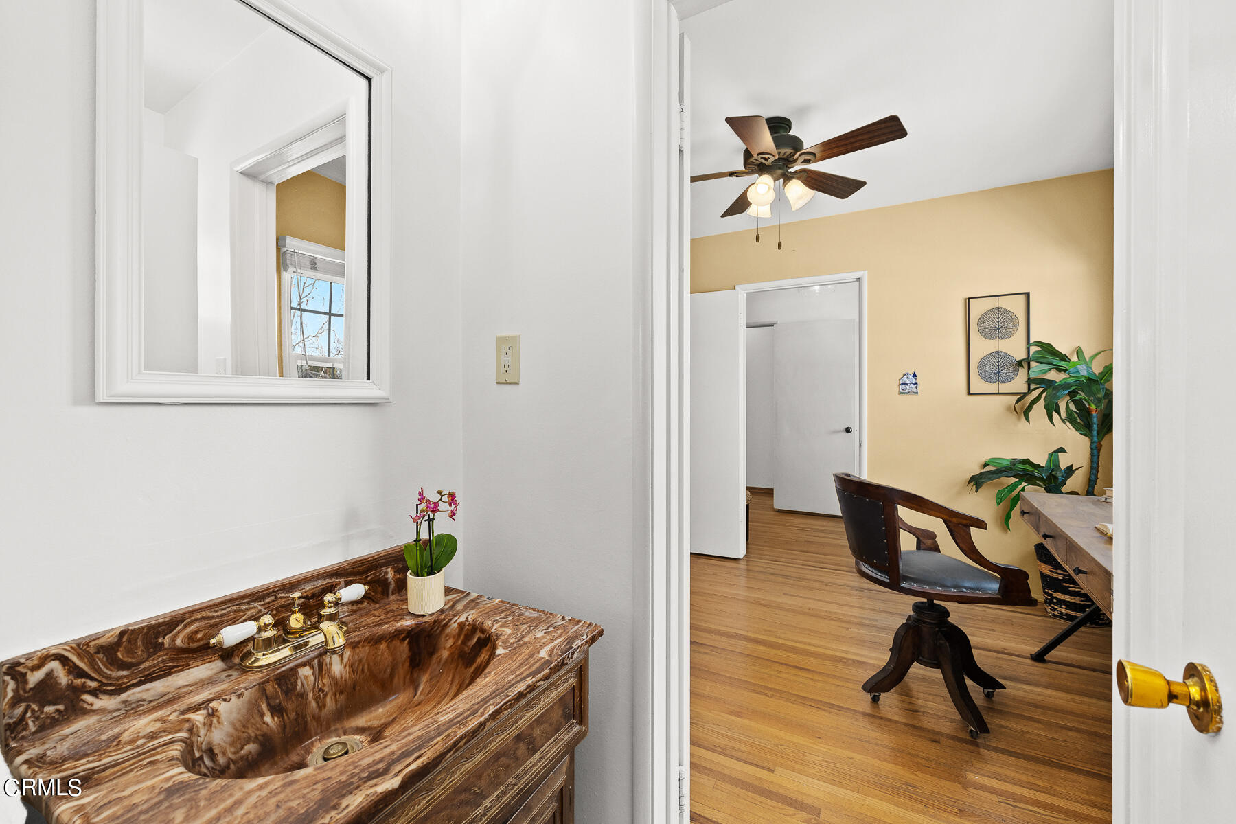 632 Brown Drive Burbank, CA 91504 - Photo 28 of 49 a bedroom with a bed and wooden floor