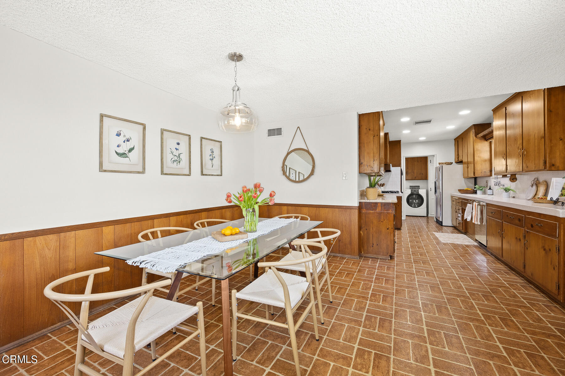 632 Brown Drive Burbank, CA 91504 - Photo 46 of 49 a view of a dining room with furniture and a chandelier