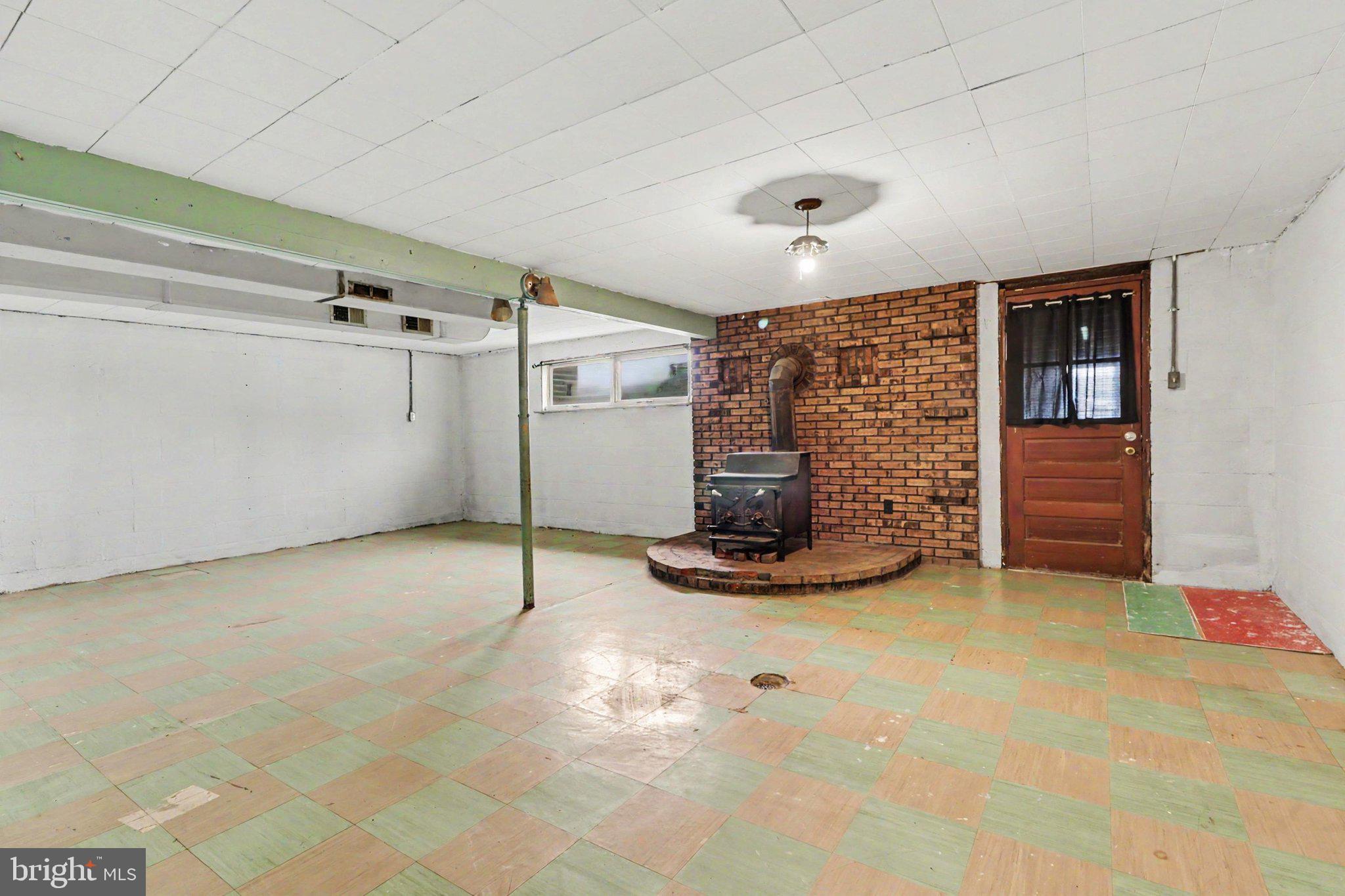 708 Baltimore Road Shippensburg, PA 17257 - Photo 17 of 24 a view of a livingroom with a patio and a ceiling fan