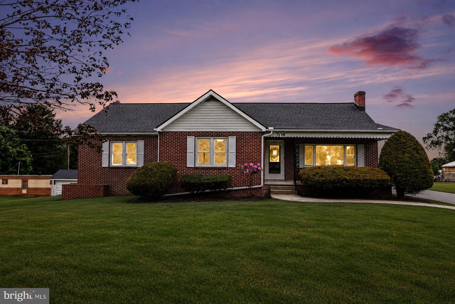 708 Baltimore Road Shippensburg, PA 17257 - Photo 24 of 24 a view of a brick house with a big yard