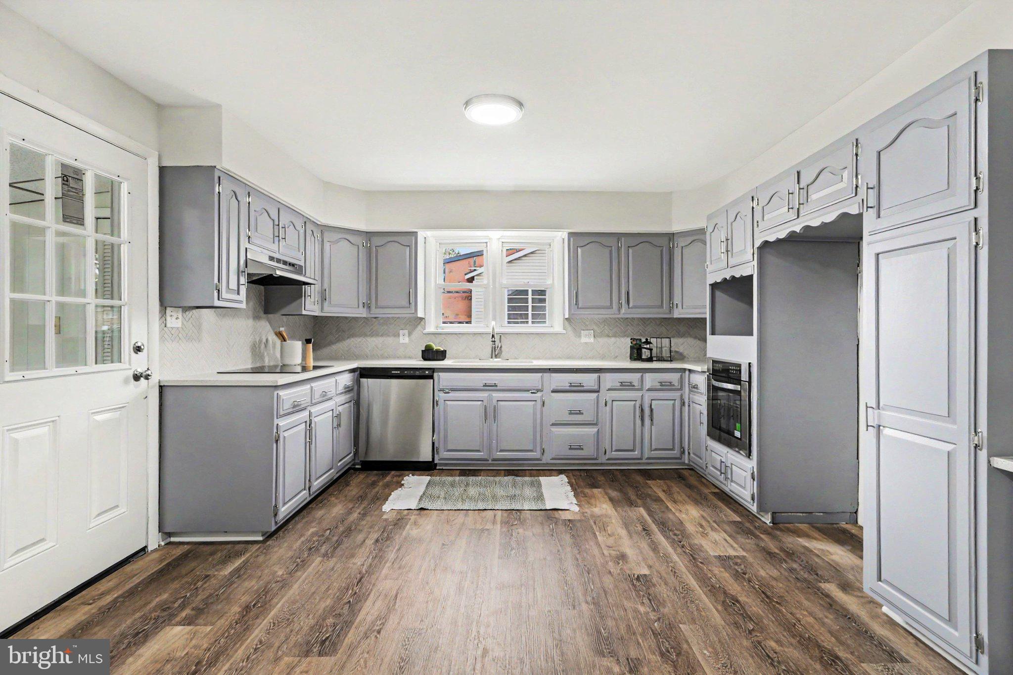 708 Baltimore Road Shippensburg, PA 17257 - Photo 5 of 24 a kitchen with stainless steel appliances a refrigerator sink and cabinets