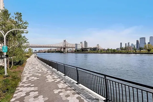 a view of balcony with city and ocean view