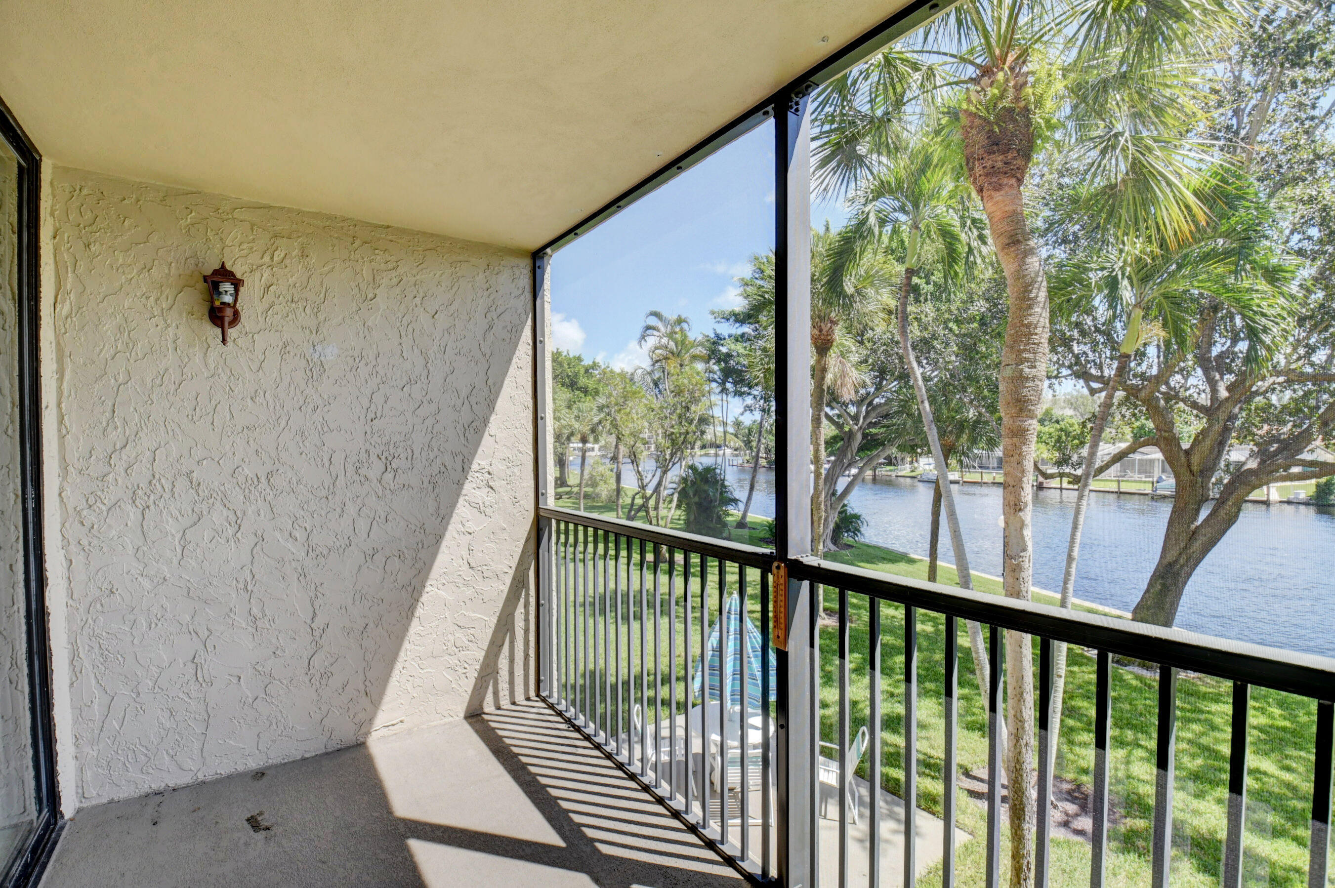 14 Royal Palm Way, Unit 2050 Boca Raton, FL 33432 - Photo 16 of 44 a view of a balcony with wooden floor