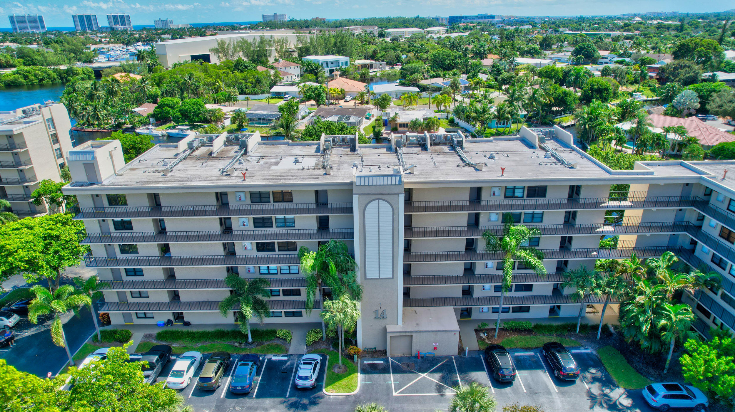 14 Royal Palm Way, Unit 2050 Boca Raton, FL 33432 - Photo 2 of 44 a view of a patio with plants and outdoor seating
