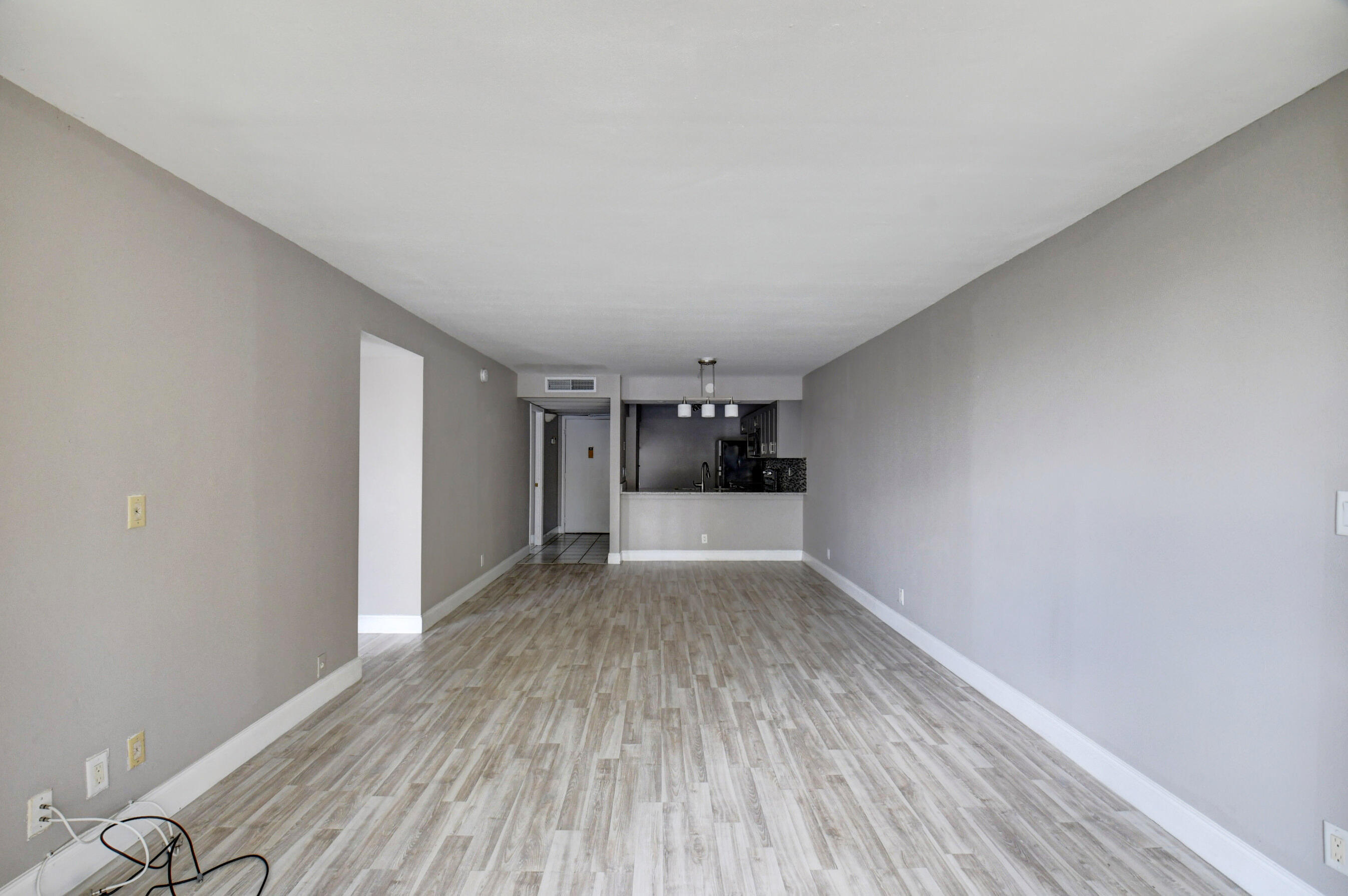 14 Royal Palm Way, Unit 2050 Boca Raton, FL 33432 - Photo 23 of 44 a view of empty room with wooden floor