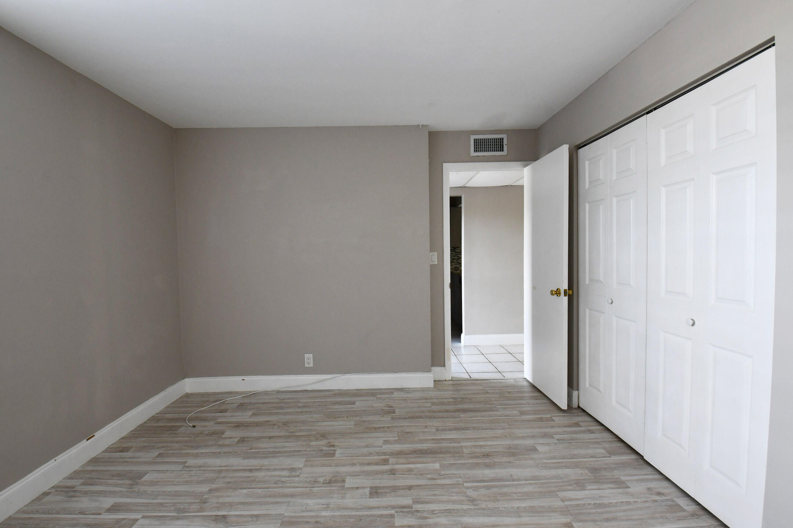 14 Royal Palm Way, Unit 2050 Boca Raton, FL 33432 - Photo 31 of 44 a view of hallway with wooden floor
