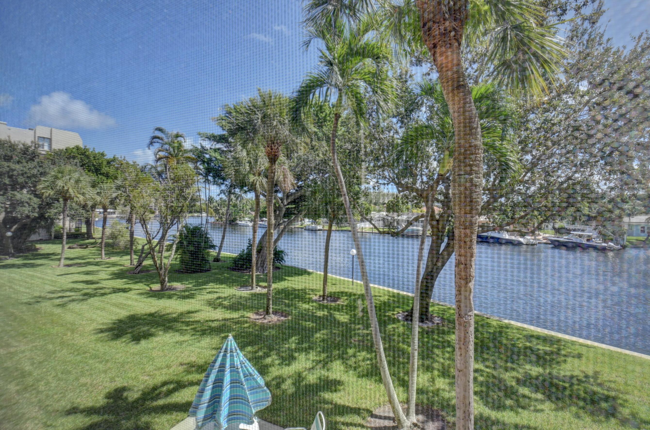 14 Royal Palm Way, Unit 2050 Boca Raton, FL 33432 - Photo 34 of 44 a garden view with a seating space