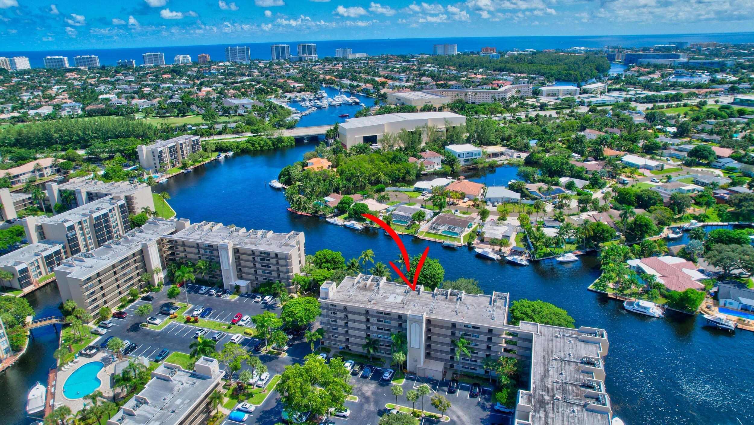 14 Royal Palm Way, Unit 2050 Boca Raton, FL 33432 - Photo 4 of 44 an aerial view of a house with a lake view