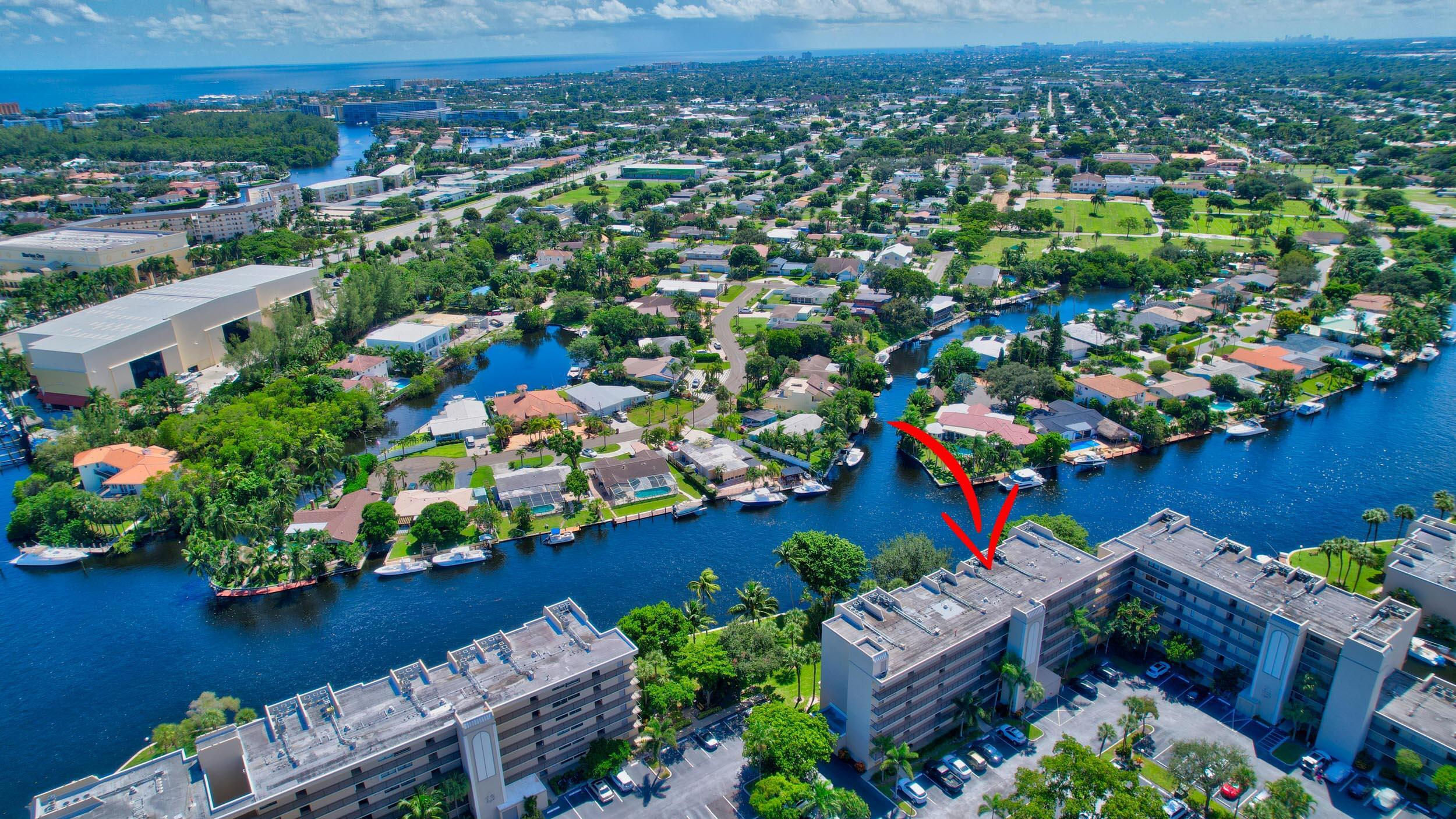 14 Royal Palm Way, Unit 2050 Boca Raton, FL 33432 - Photo 6 of 44 an aerial view of a house with a yard