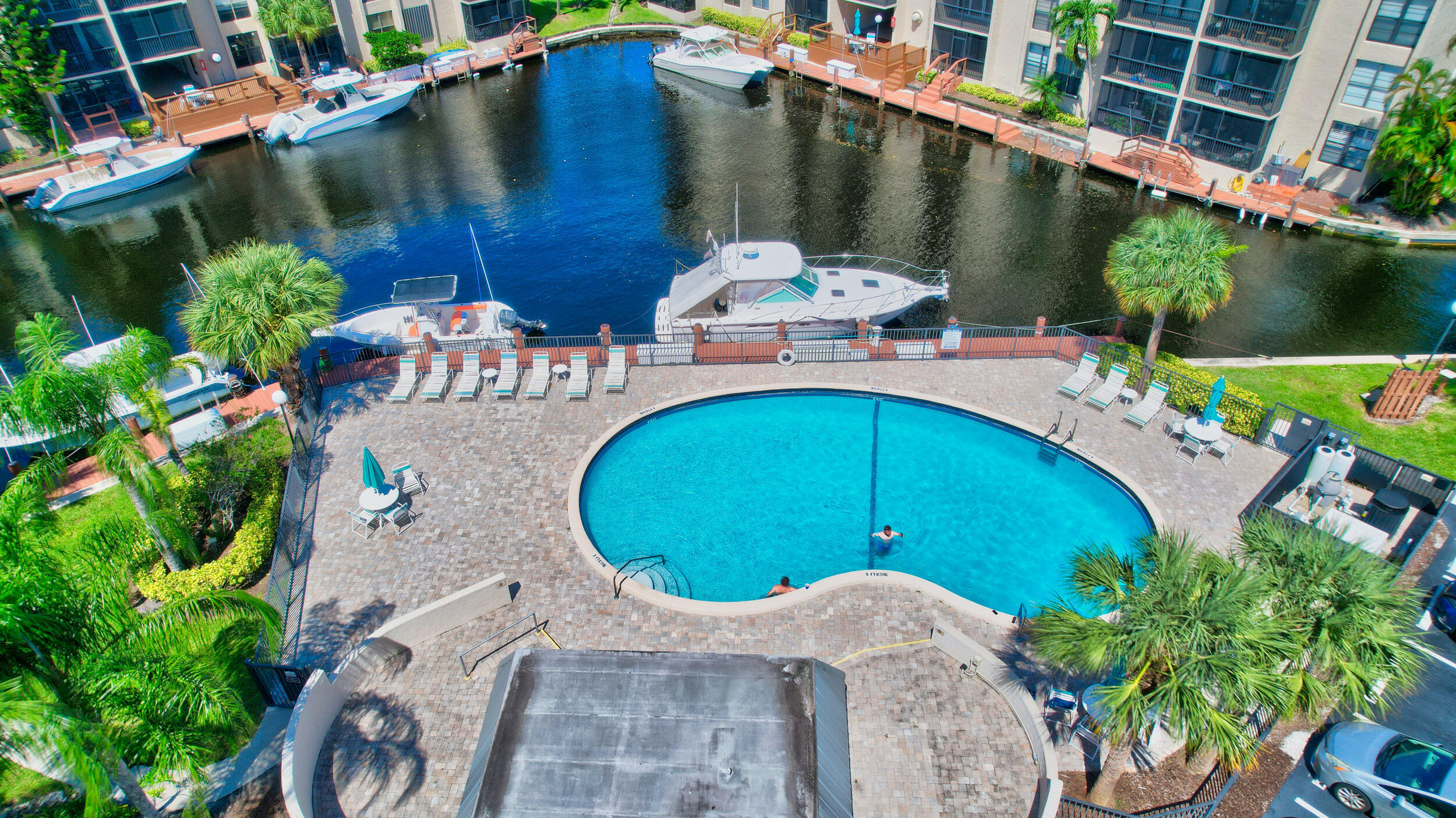 14 Royal Palm Way, Unit 2050 Boca Raton, FL 33432 - Photo 8 of 44 an aerial view of a house with outdoor space and lake view