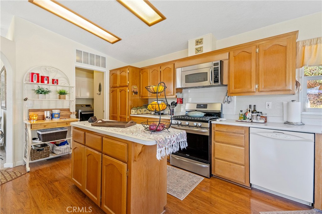 4135 Peruvian Way Paso Robles, CA 93446 - Photo 13 of 45 Pull out drawers on the island for storage and in the pantry for easy access. Plenty of storage.