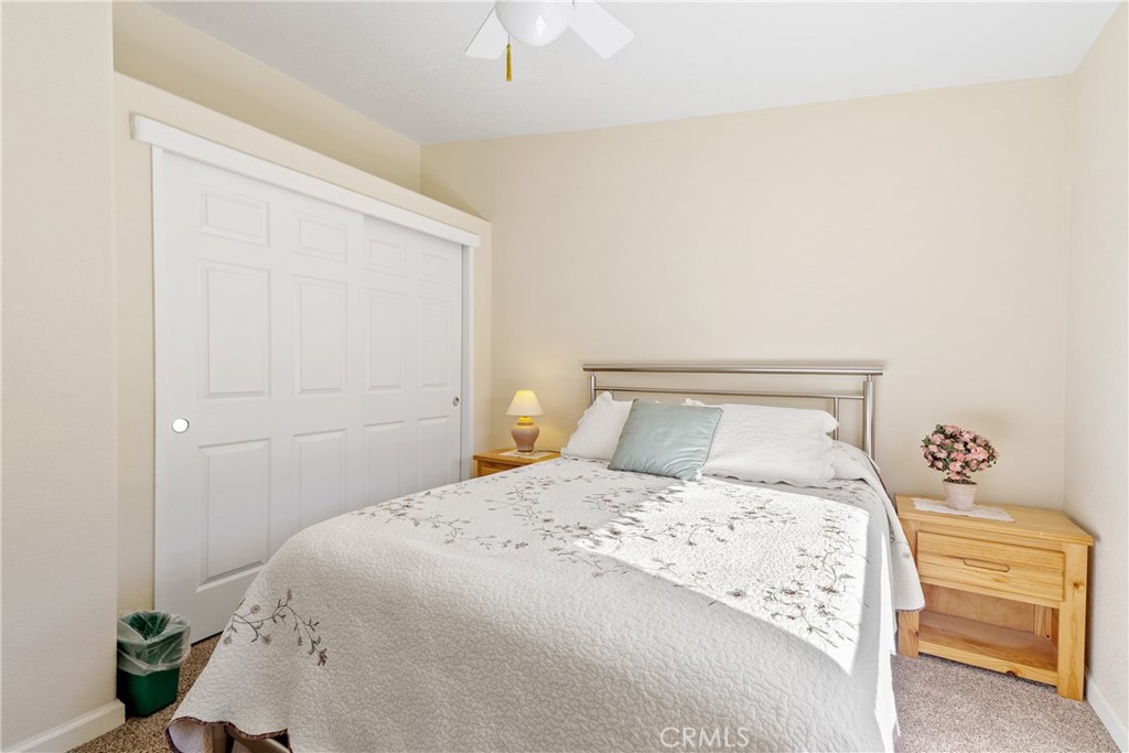 4135 Peruvian Way Paso Robles, CA 93446 - Photo 22 of 45 Guest bedroom has custom closet by California Closets for added storage.