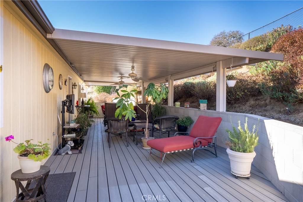 4135 Peruvian Way Paso Robles, CA 93446 - Photo 29 of 45 The back deck is partially covered. Composite decking wraps around about 1/2 of the house.