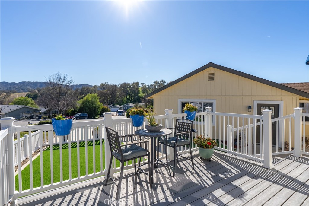 4135 Peruvian Way Paso Robles, CA 93446 - Photo 5 of 45 NIce area on front deck with views of hillside in the distance