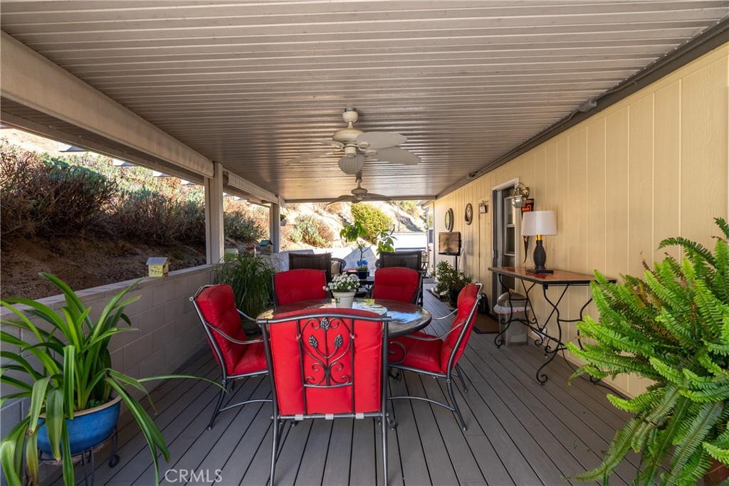 4135 Peruvian Way Paso Robles, CA 93446 - Photo 9 of 45 View of the covered deck looking down to other end.