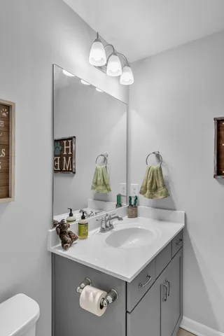 a bathroom with a toilet a sink and a bathtub