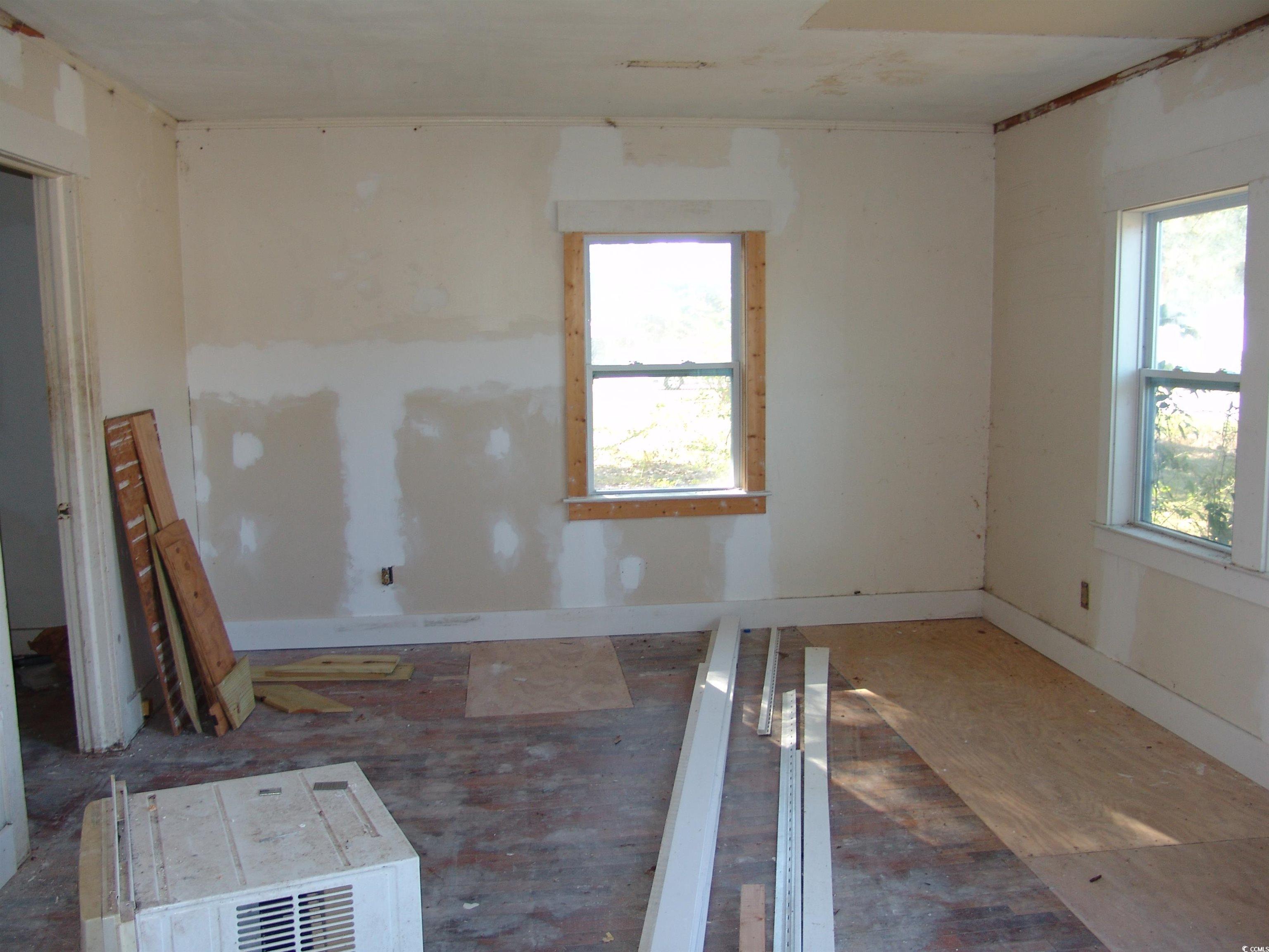 62 Pear Way Andrews, SC 29510 - Photo 3 of 7 Unfurnished room with a healthy amount of sunlight
