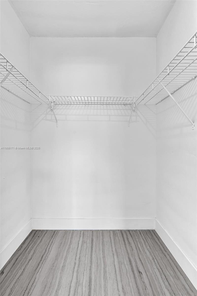 101 Southeast 6th Avenue, Unit 1 Pompano Beach, FL 33060 - Photo 23 of 30 a view of an empty walk in closet