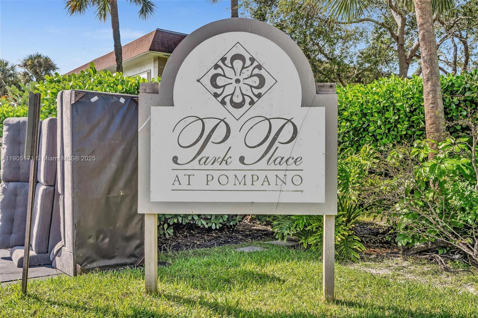 101 Southeast 6th Avenue, Unit 1 Pompano Beach, FL 33060 - Photo 29 of 30 a sign broad next to a yard