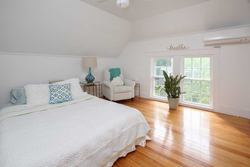5 Braeburn Road Newton, MA 02466 - Photo 13 of 19 a bedroom with bed and wooden floor