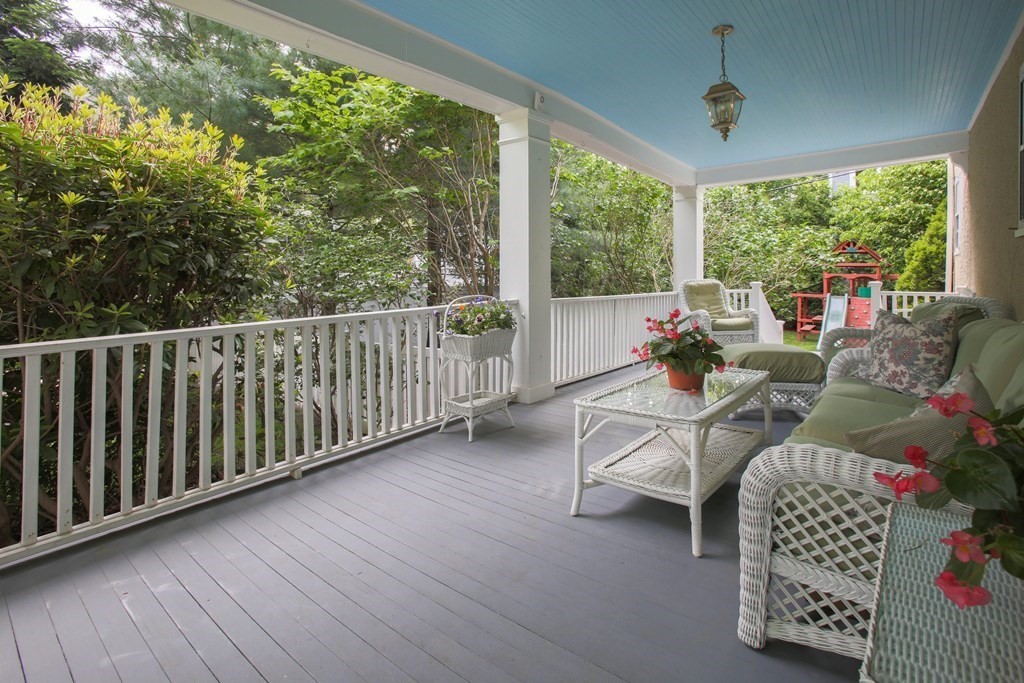 5 Braeburn Road Newton, MA 02466 - Photo 2 of 19 a balcony with furniture and garden view