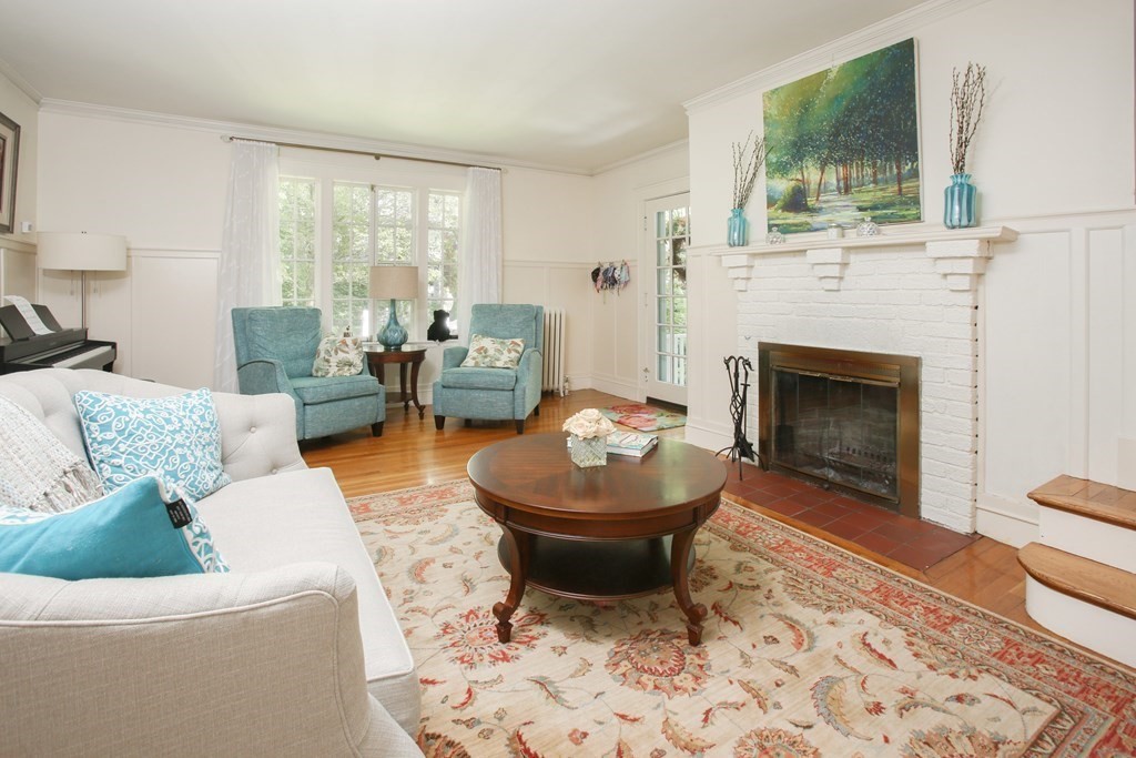 5 Braeburn Road Newton, MA 02466 - Photo 4 of 19 a living room with furniture a window and a fireplace