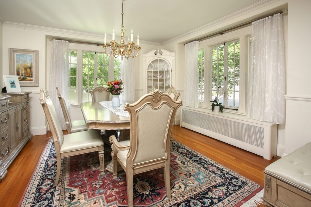5 Braeburn Road Newton, MA 02466 - Photo 5 of 19 a view of a dining room with furniture wooden floor and chandelier
