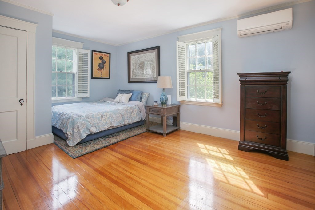 5 Braeburn Road Newton, MA 02466 - Photo 10 of 19 a bedroom with a bed and a window