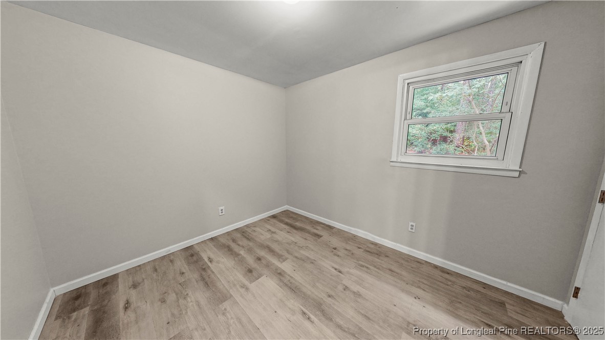 164 Happy Valley Road West End, NC 27376 - Photo 13 of 17 an empty room with a window