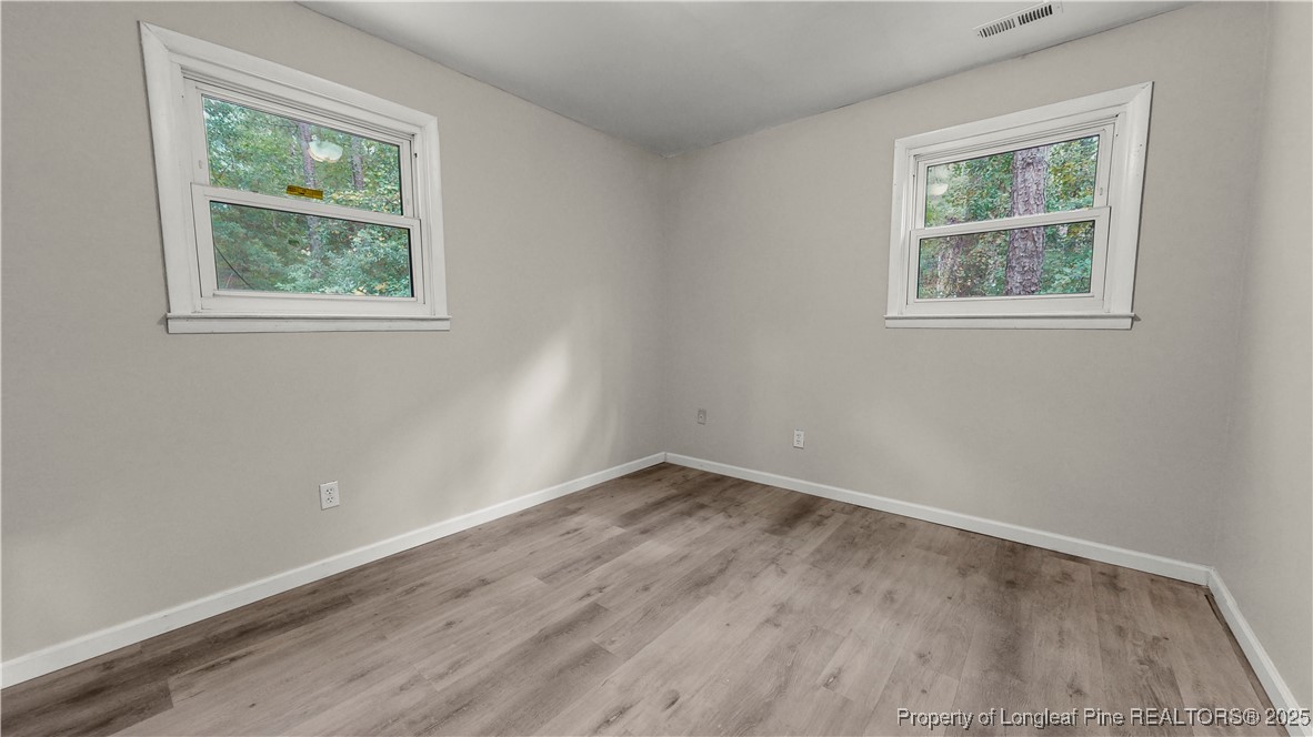164 Happy Valley Road West End, NC 27376 - Photo 9 of 17 an empty room with a window