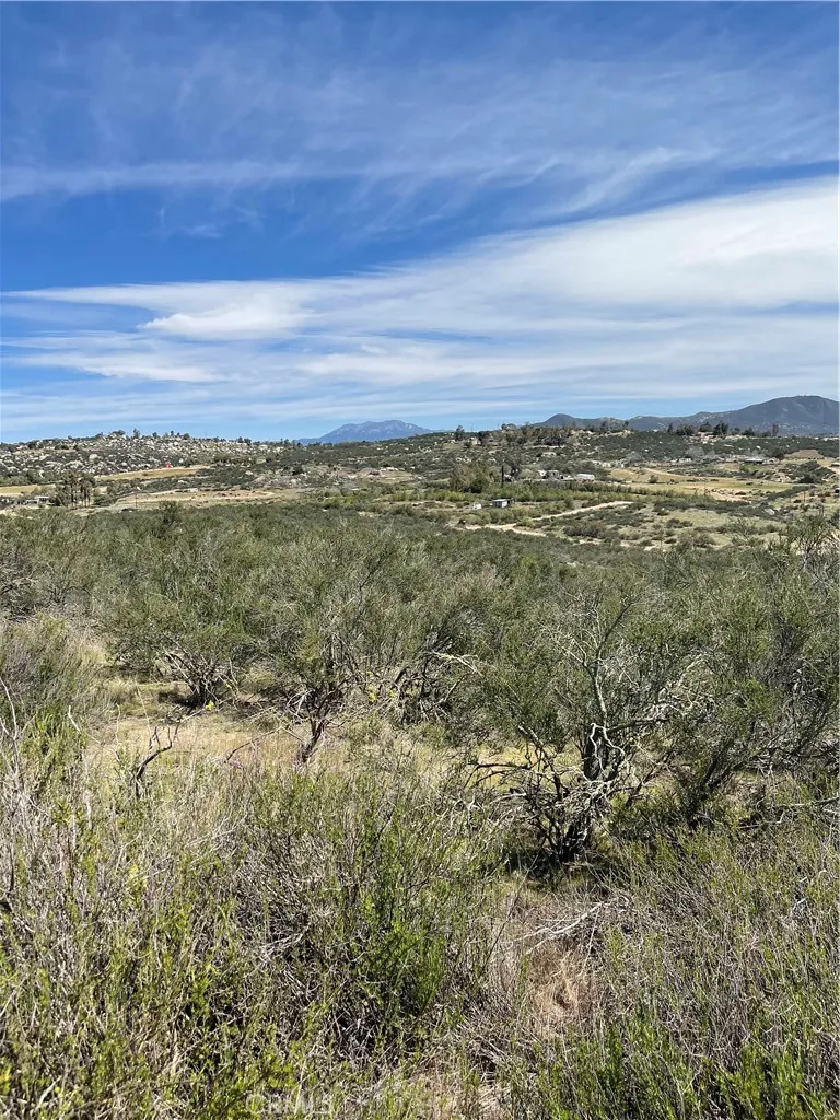 57 Madera Street Hemet, CA 92544 - Photo 1 of 4 a view of a large green field