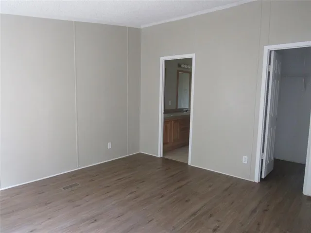 a bathroom with a shower and a door