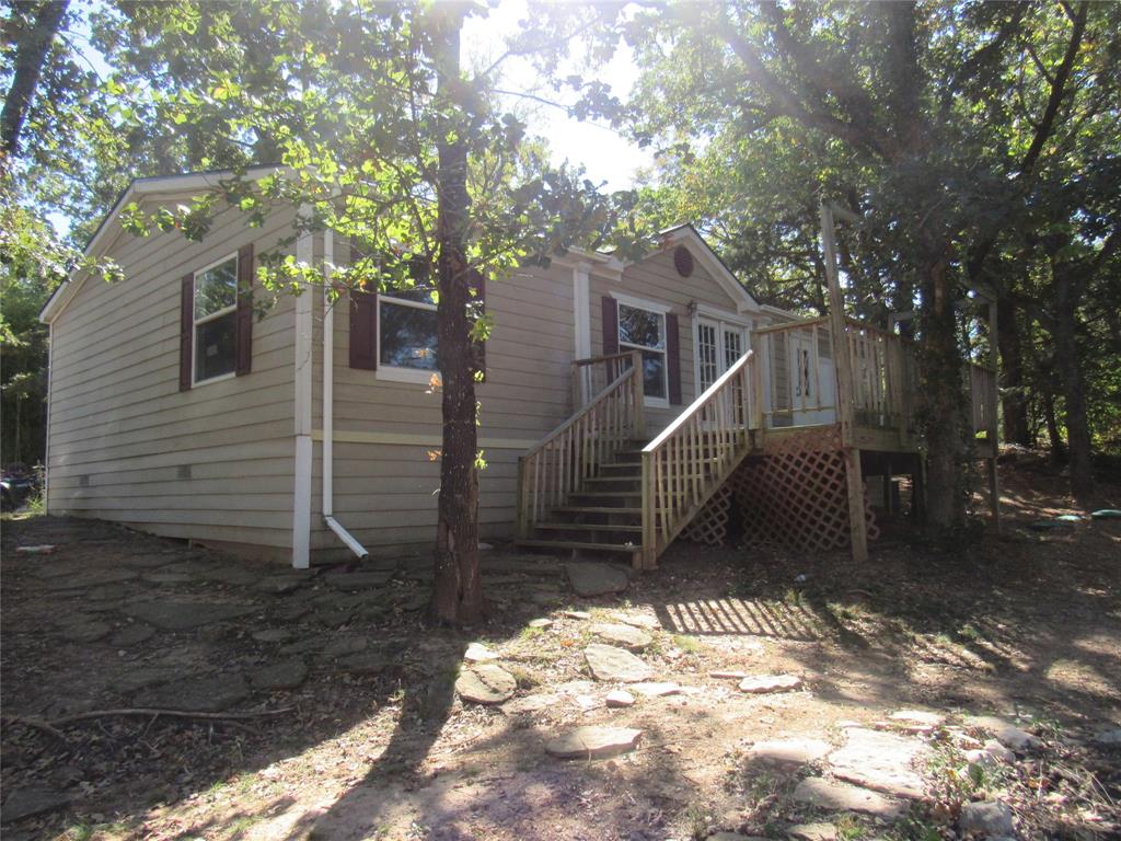 40 Cleveland Avenue Pottsboro, TX 75076 - Photo 6 of 29 a view of a house with a small yard