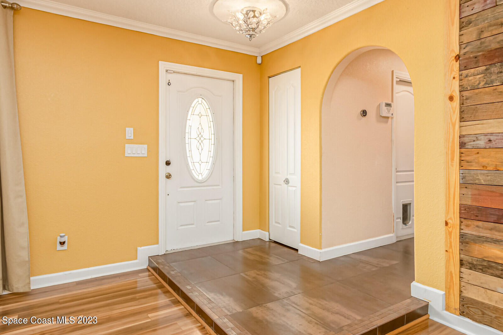 2567 Wright Avenue Melbourne, FL 32935 - Photo 13 of 36 a view of a hallway with entryway door